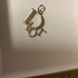 DIOR CHARM WILL COME WITH A THIN CHAIN THE CHAIN IS NOT DIOR